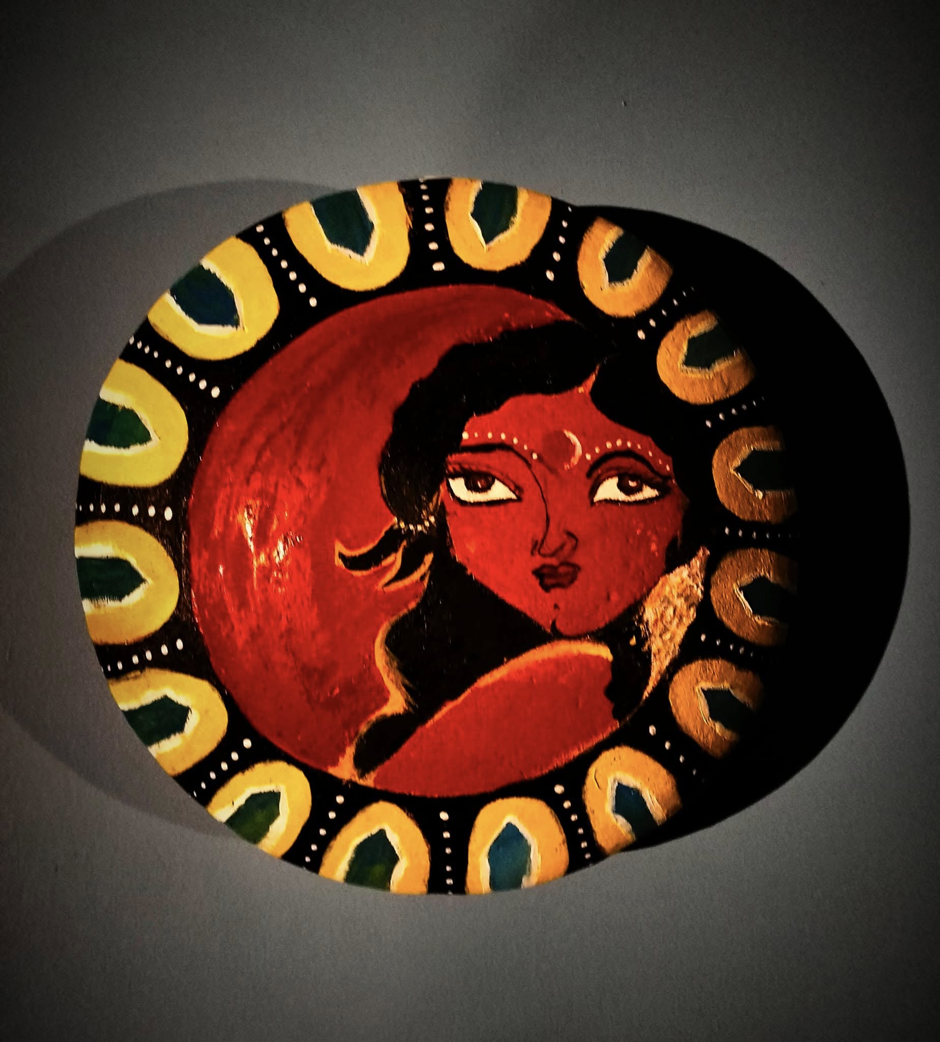 Hand-painted folk art terracotta plate